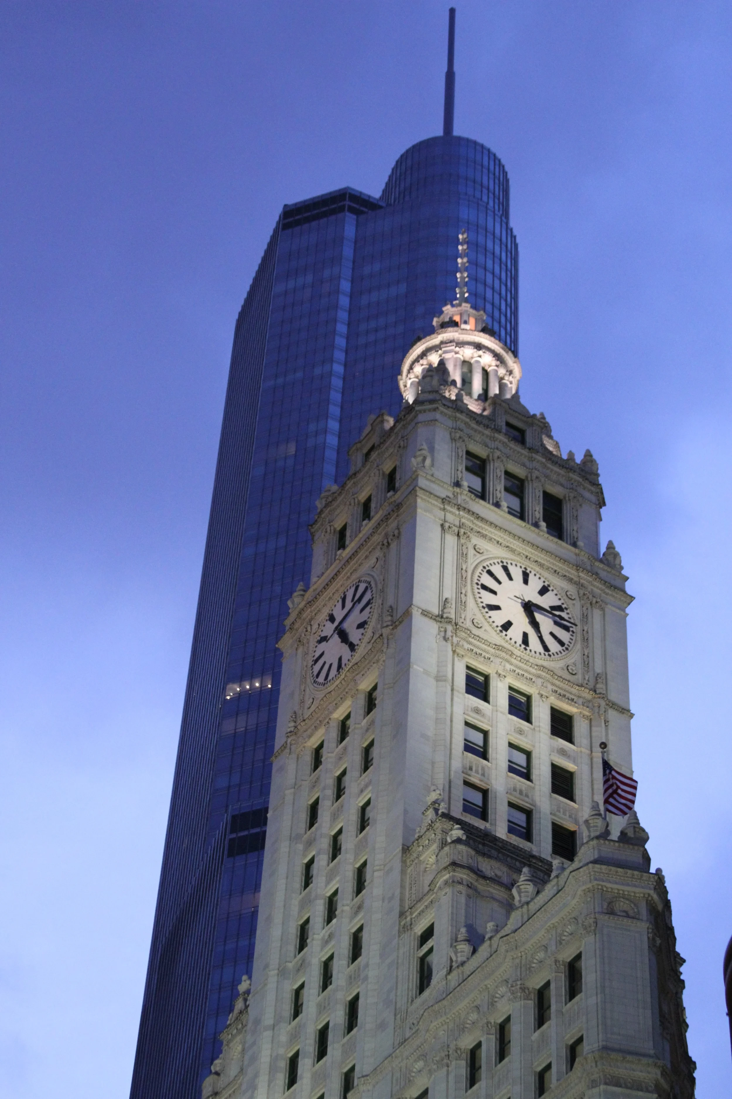 Historic Chicago clock tower and modern city skyline